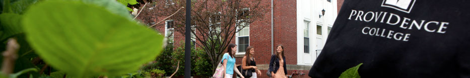 Shot of students walking, taken from the bushes